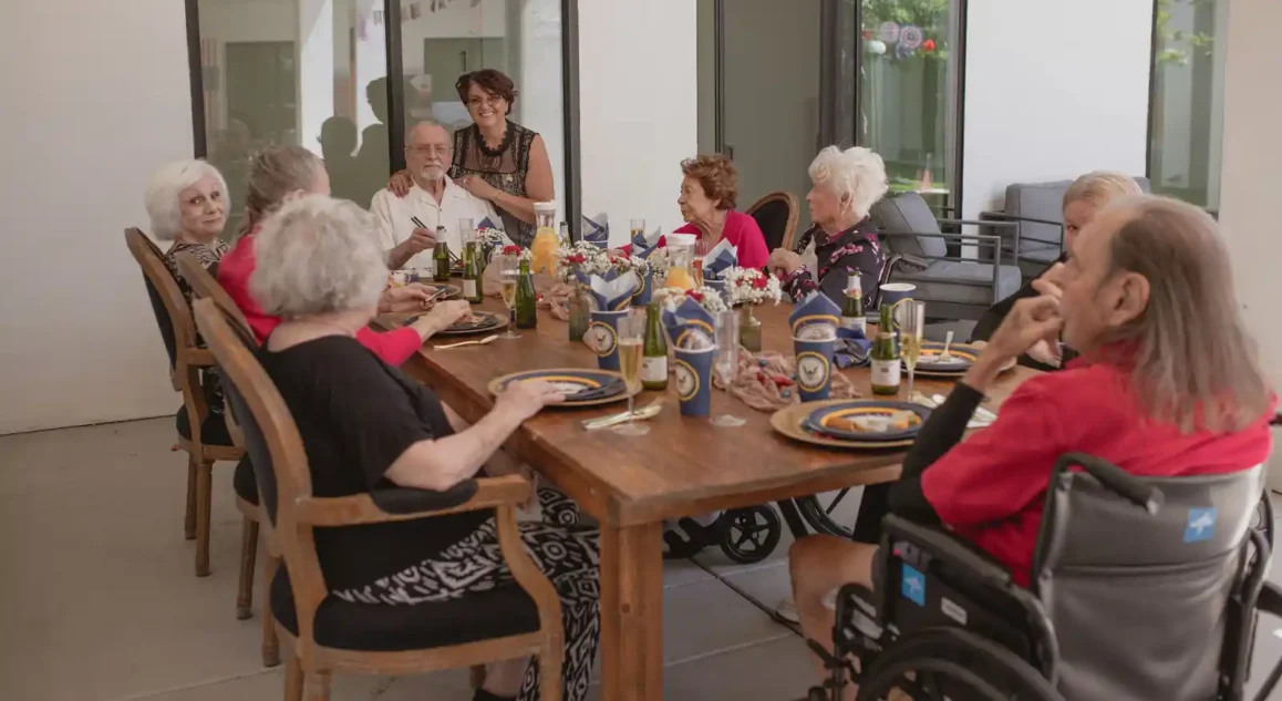 a group of senior residents enjoying a social gathering at torbrook assisted living